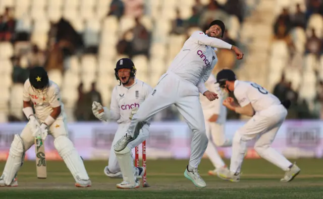 Joe Root and England celebrate wicket of Imam-ul-Haq in second Pakistan v England Test in Multan