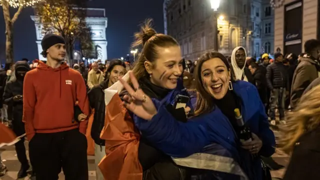 French supporters celebrate their team winning the Fifa World Cup 2022 quarter final match between France and England in Paris, France, on 10 December 2022