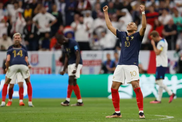 Kylian Mbappe celebrates after the final whistle in the quarter final match between England and France