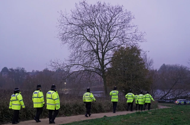 A large police cordon remains in place around the lake in Solihull, near Birmingham