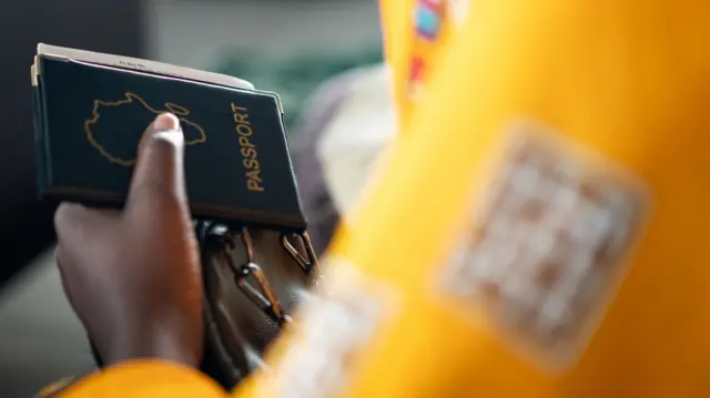 Somebody holding an African passport