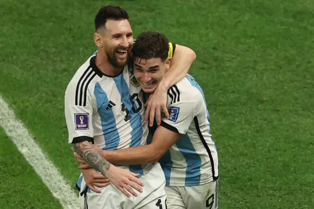 Lionel Messi and Julian Alvarez celebrate