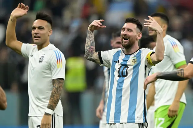 Lionel Messi celebrates Argentina reaching the 2022 World Cup final