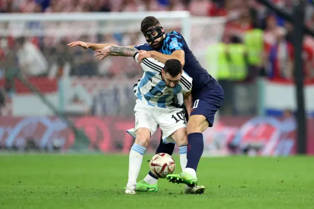 Lionel Messi of Argentina controls the ball against Josko Gvardiol of Croatia during the FIFA World Cup Qatar 2022 semi final match between Argentina and Croatia at Lusail Stadium