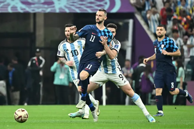 Marcelo Brozovic and Julian Alvarez fight for the ball during the Qatar 2022 World Cup football semi-final match between Argentina and Croatia at Lusail Stadium