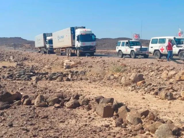 A convoy of trucks from the International Committee of the Red Cross (ICRC) deliver lifesaving medical supplies are seen on the road to Mekelle, in Tigray region