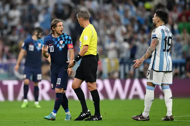 Luka Modric of Croatia argues a call with referee Daniele Orsato during the FIFA World Cup Qatar 2022 semi final match between Argentina and Croatia at Lusail Stadium