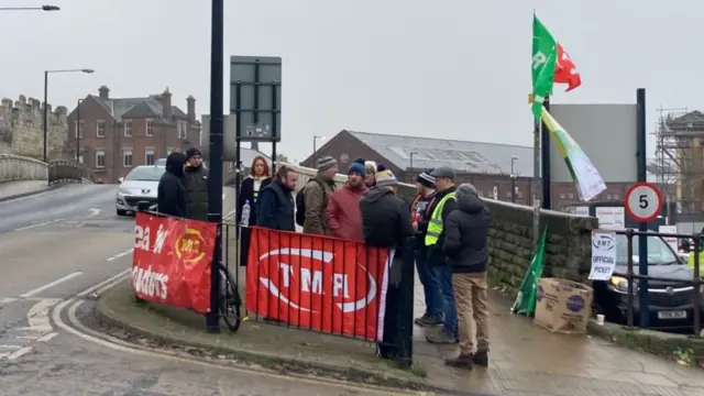 RMT union members striking outside York station