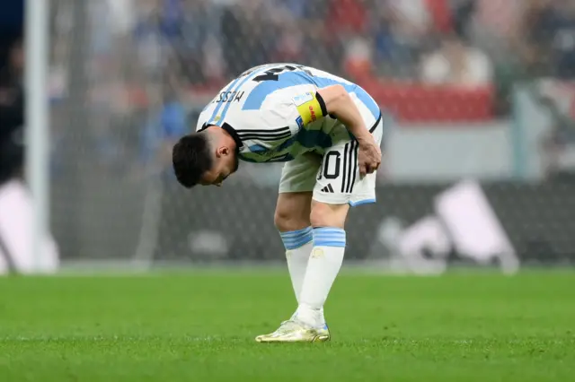 Lionel Messi feels his left hamstring