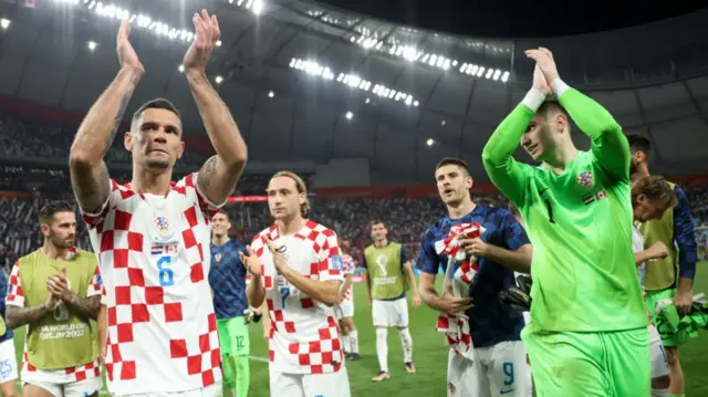 Croatia players celebrate beating Canada