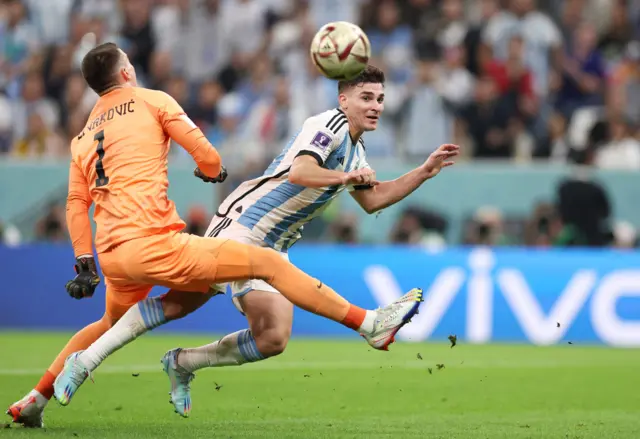 Julian Alvarez is fouled to win Argentina a penalty