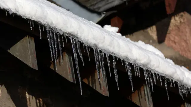 Icicles form on a gutter in Braemar