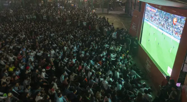 Bangladesh fans watch Argentina in the World Cup semi-final