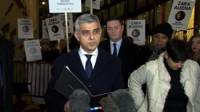 London Mayor Sadiq Khan speaks to reporters outside court