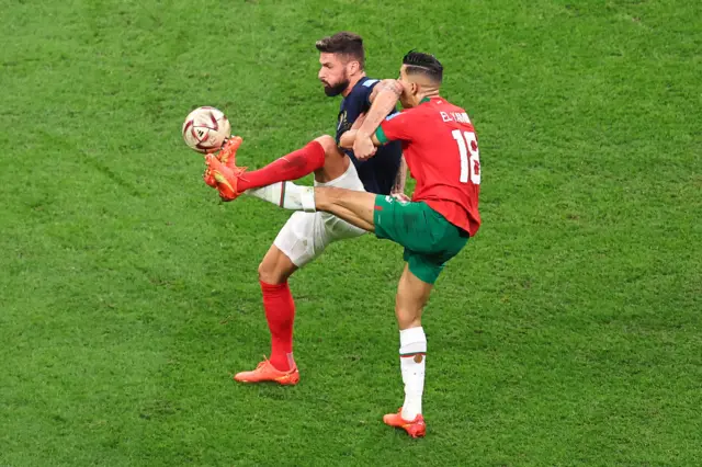 Olivier Giroud holds the ball up