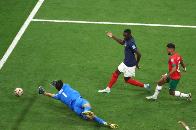 Randal Kolo Muani scores France's second goal against Morocco