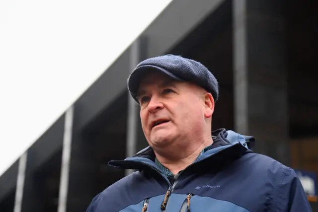 Mick Lynch speaks on a picket line