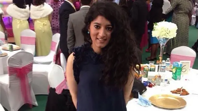 Zara Aleena, smiling at what appears to be a wedding banquet