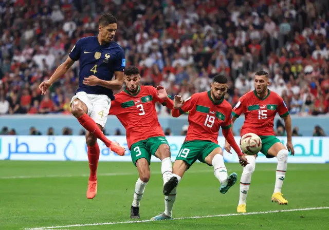 Raphael Varane flicks a shot into the side-netting