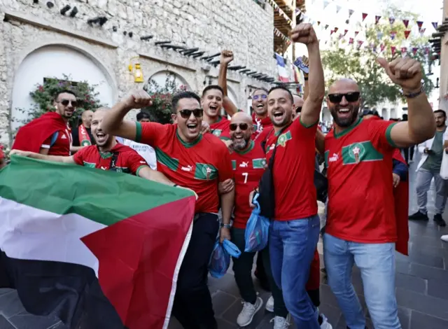 Morocco fans with Palestine flag