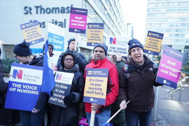 Members of the Royal College of Nursing on the picket line outside St Thomas' Hospital in London