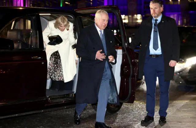 King Charles and Queen Consort Camilla get out of their car