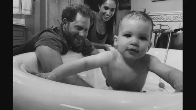 Harry and Meghan bathing Archie