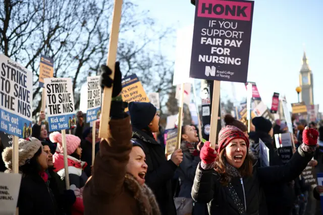 Nurses strike outside St Thomas's Hospital, London