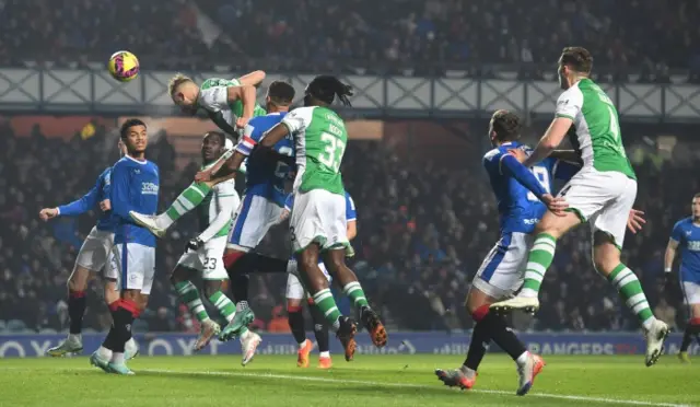 Ryan Porteous rises to score for Hibs