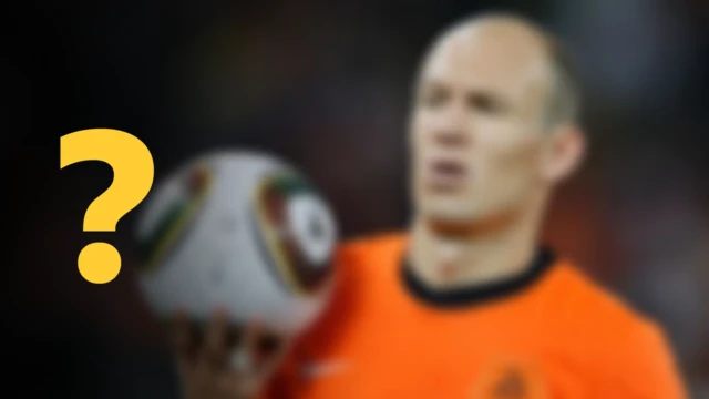 A blurred image of a footballer (for 15 December daily World Cup quiz)