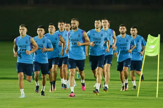 Players of Argentina run during a training session ahead