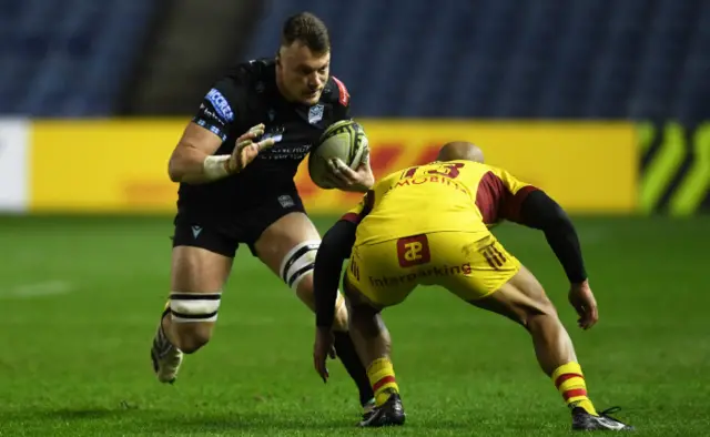 Jack Dempsey eludes a would-be Perpignan tackler