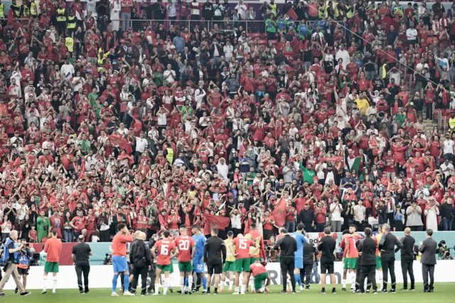 Morocco's players applaud their fans