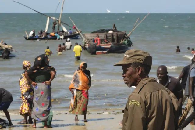 Mozambican policeman patrols the shore in Mocímboa da Praia, in the Cabo Delgado province, Mozambique, on September 27, 2022