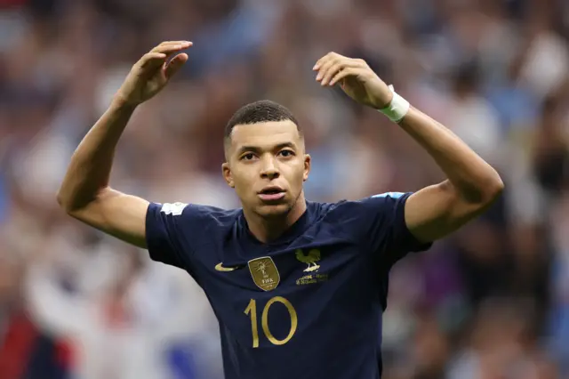 Kylian Mbappe celebrates