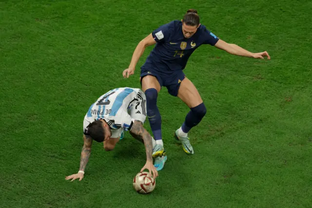 Adrien Rabiot tackles De Paul