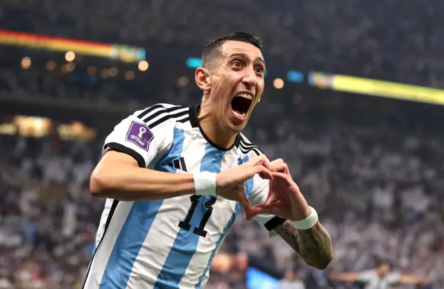 Angel Di Maria of Argentina celebrates after scoring the team's second goal during the FIFA World Cup Qatar 2022 Final match between Argentina and France at Lusail Stadium