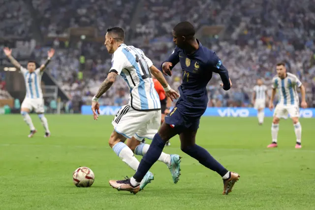 Angel di Maria is fouled by Ousmane Dembele to give Argentina a penalty in the 2022 World Cup final