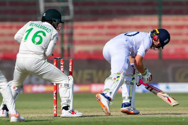 Ollie Pope being bowled by Abrar Ahmed