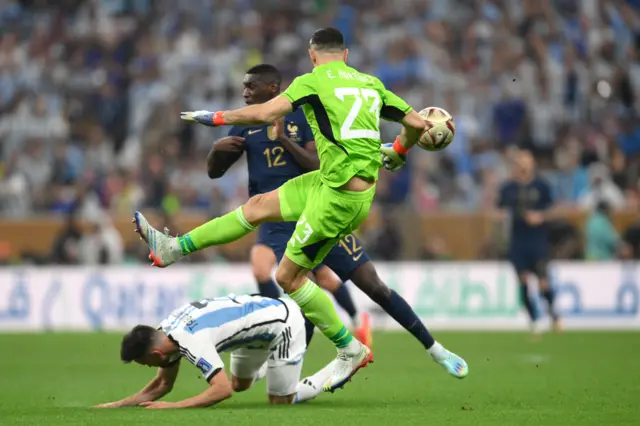 Emiliano Martinez of Argentina clears the ball during the FIFA World Cup Qatar 2022 Final match between Argentina and France at Lusail Stadium on December 18, 2022 in Lusail City, Qatar