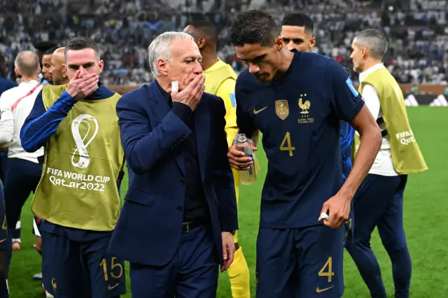 Didier Deschamps speaks to Raphael Varane