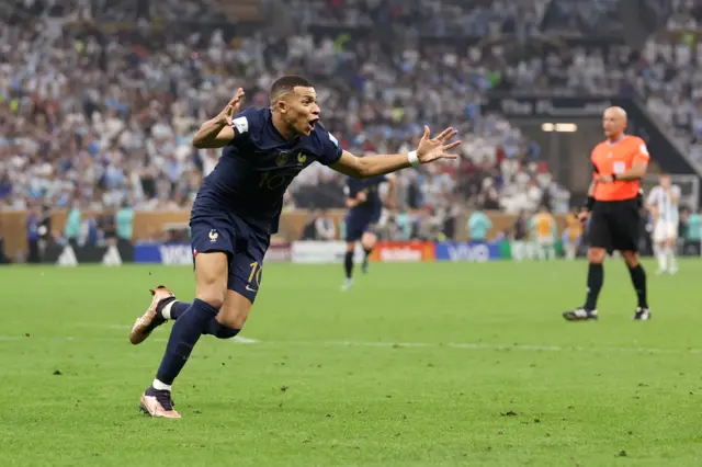 Kylian Mbappe celebrates