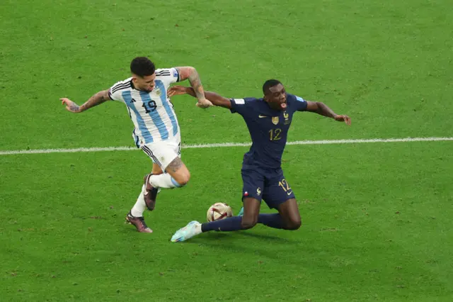 Nicolas Otamendi of Argentina fouls Randal Kolo Muani of France which leads to a penalty for France during the FIFA World Cup Qatar 2022 Final match between Argentina and France at Lusail Stadium