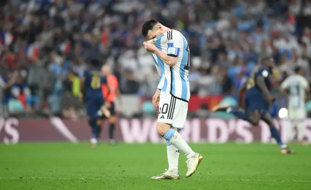 Lionel Messi looks dejected against France's equaliser