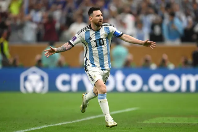 Lionel Messi celebrates giving Argentina the lead against France in the 2022 World Cup final