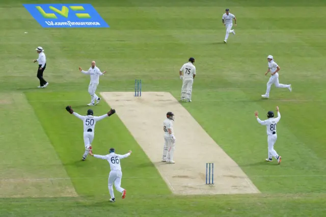 England celebrating Jack Leach's dismissal of Henry Nicholls