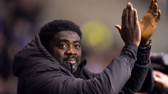 Kolo Toure applauds