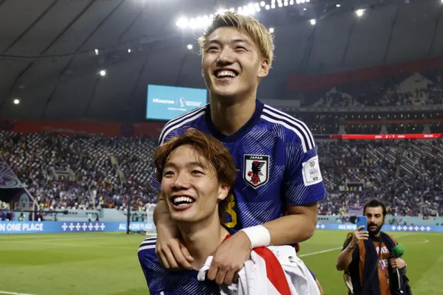 Ko Itakura and Risu Doan of Japan celebrating at the FIFA 2022 World Cup