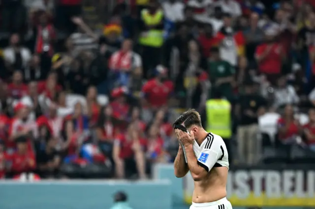 Niclas Fuellkrug reacts at the end of the Qatar 2022 World Cup Group E football match between Costa Rica and Germany at the Al-Bayt Stadium in Al Khor, north of Doha