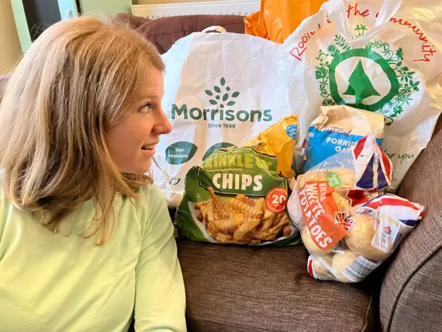 Bags of shopping from different supermarkets